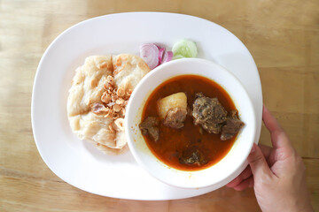 naan bread or roti with curry soup or beef stewed