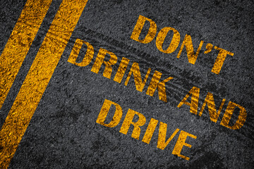 Don't Drink and Drive written on the road,Lane with the text Dont drink and drive