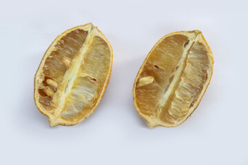 Dried bad lemon. Spoiled fruit.