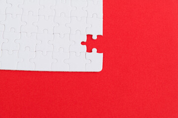 One piece of white puzzle is missing