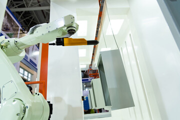 Fototapeta na wymiar Robotic arm for painting in factory