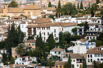 Architectural details of the Alhambra fortified palace complex and Granada city