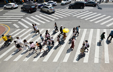 Group of people crossing the crosswalk