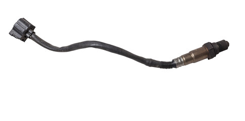 Lambda probe - oxygen sensor device designed to record tamount of remaining oxygen in the exhaust gas of car engine is located in exhaust system. Metal spare part for replacement to repair in workshop