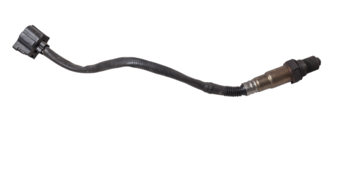 Lambda probe - oxygen sensor device designed to record tamount of remaining oxygen in the exhaust gas of car engine is located in exhaust system. Metal spare part for replacement to repair in workshop