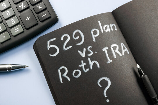 Open notepad with sign 529 plan vs Roth IRA.