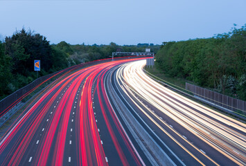 Traffic light trails on the M4 motorway heading towards London.