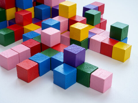 An abstract system of colored cubes as a symbol of complex structure and connections.
