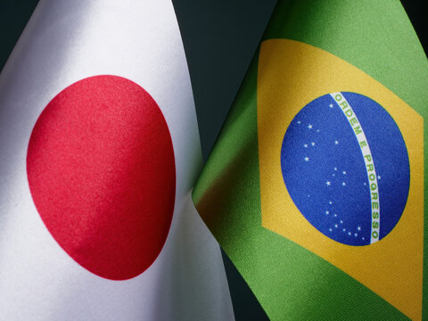 Nearby are small flags of Japan and Brazil.