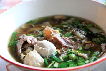 Noodles, Asian food or Noodles with pork and meatballs in a bowl, ready to eat.