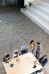 Aerial view at young startup team working in the office