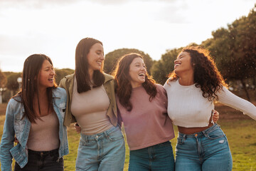 Four happy girl friends sharing meaningful moments together.