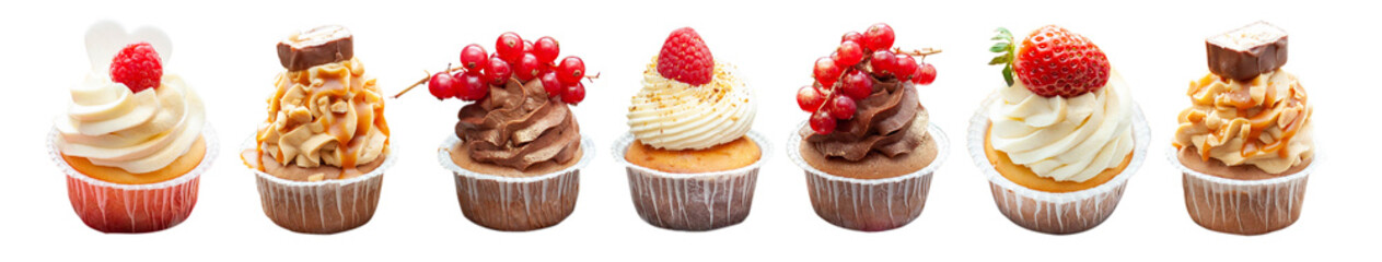 Set of chocolate, vanilla and salted caramel cupcakes with fresh berries and peanuts isolated on...