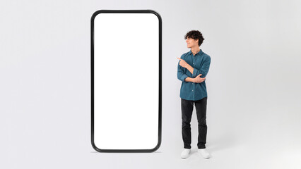 Man Posing With Smartphone Advertising Blank App Space, White Background