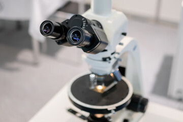 Fototapeta na wymiar Professional medical microscope in science lab, exhibition. Medicine, technology, laboratory concept