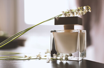 Women's perfume and lilies of the valley