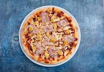 tasty pizza on the wooden background