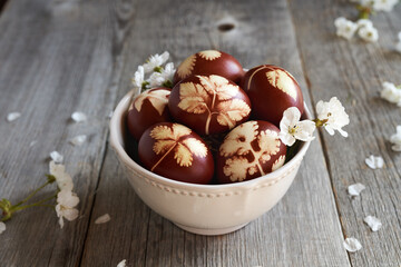 Easter Eggs dyed with onion peels, with cherry blossoms