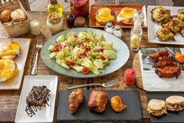 Set of typical brunch dishes with sweets