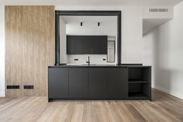 Living room of a house with black furniture