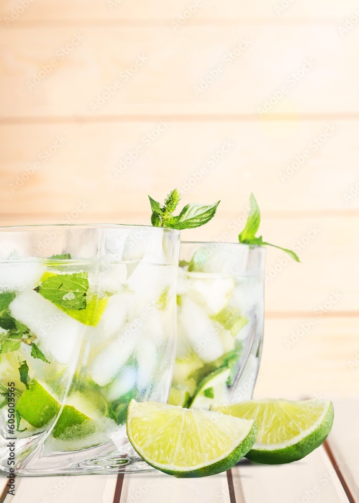 Wall mural Refreshing tasty drink with ice and mint.