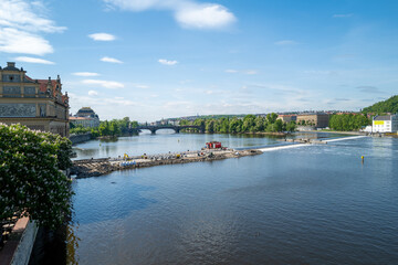 Fototapeta na wymiar the big river Moldova in Prague in nice weather