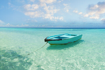  Beautiful maldives tropical island with a boat - Panorama. Time out on summer vacation concept.