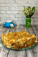 Napoleon cake on a plate close-up