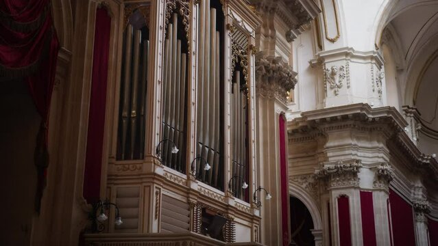 Ancient pipe organ inside a church