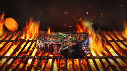 Fire embers particles over black background.  Grill Background - Empty Fired Barbecue close up Beef...