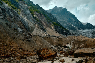 Mountain ranges on a sunny day at Georgia. Sky with clouds adn hills