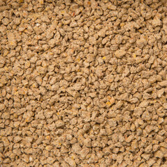 Biofuel, Biofuels, Eco Fuels. Close-Up of the Cat's Litter Box. Filling the Cat Litter Tray. Pet Shop Concept. Products for Pets. Small Orange Pebbles. Products for Pets