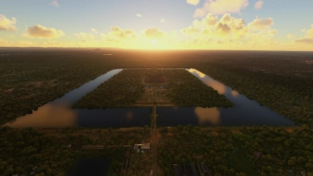 Aerial - Flying over the Temple of Angkor Wat at sunset. Cambodia