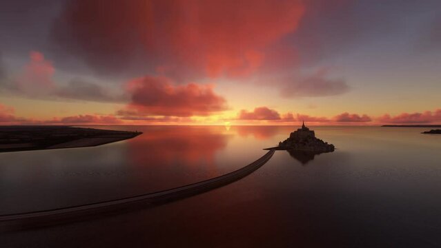 Aerial - Flying over the sea at sunset from Mont Saint-Michel in the Normandy region. France