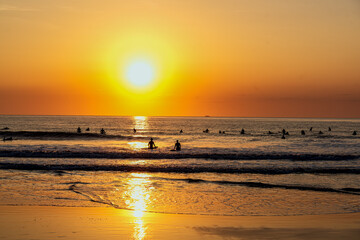 Naklejka premium Surfers At Sunrise