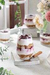 Sweet homemade dessert with cherries and cream.
