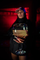 Buenos Aires, Argentina; 08-24-2022: a beatiful girls posing for a photo at a party. Young people dancing in night club party. selective focus. Long exposure. Moving lights. party concept. Party night