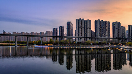 Fototapeta na wymiar Landscape of buildings along the Yitong River in Changchun, China