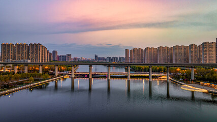 Fototapeta premium Landscape of buildings along the Yitong River in Changchun, China