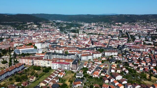 Aerial panoramic overview of sprawling homes of ourense, galicia, spain
