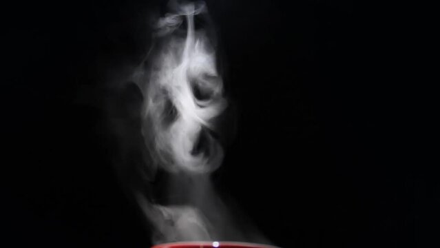 Food steam. Steam from hot drink. Smoke from something burning. Coffee steam.