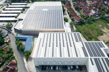 Eco building, shopping center in aerial view. Solar cell or photovoltaic cell in panel on top of...
