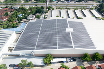 Eco building, shopping center in aerial view. Solar cell or photovoltaic cell in panel on top of...