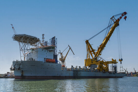 The world's largest ship, a crane for erecting windmills at sea, displacement 61,000, lifting capacity 5,000 tons, moored at the quay of Stocznia Remontowa, Gdansk, Poland - Les Aliz&eacute;s (IMO number 991