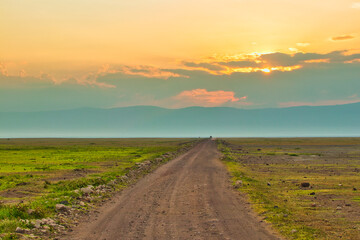 Fototapeta na wymiar Sunrise view over the safari trails inside Ngorongoro crater, Tanzania