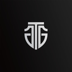 A T J shield letter logo