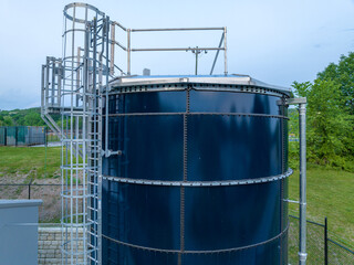 Photo of a blue steel, metal, industrial water tank, industries, commercial, municipal.
