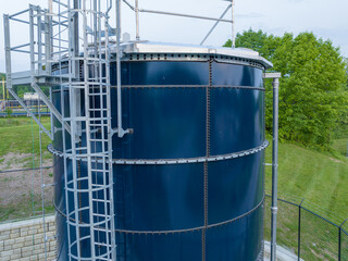 Photo of a blue steel, metal, industrial water tank, industries, commercial, municipal.
