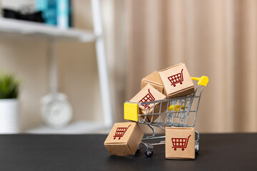 Shopping online and logistic concept. paper box in shopping cart. home delivery service....