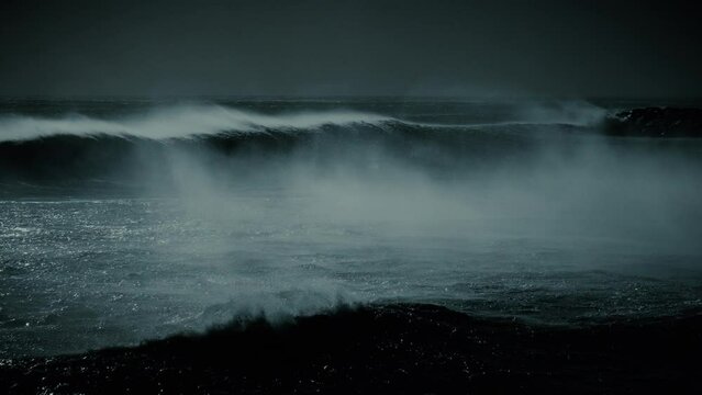 Night version, ocean waves in moonlight - shot at 60fps slowed. Moon rays shinning down on surface.